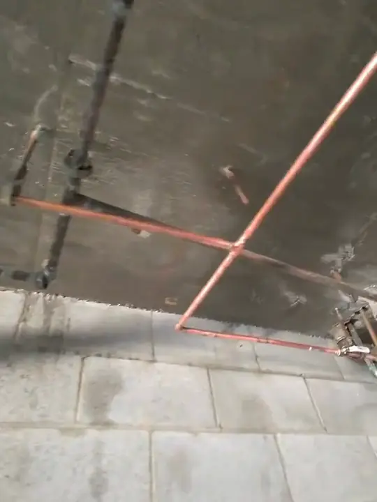 New Copper, Hung Straight: A run of new copper across a ceiling, in place before anything gets covered.
